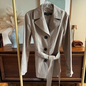 NWOT Trench Coat. Hip length, removable sash, functional side pockets.